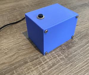 Remote gate opener, a blue box with button on top